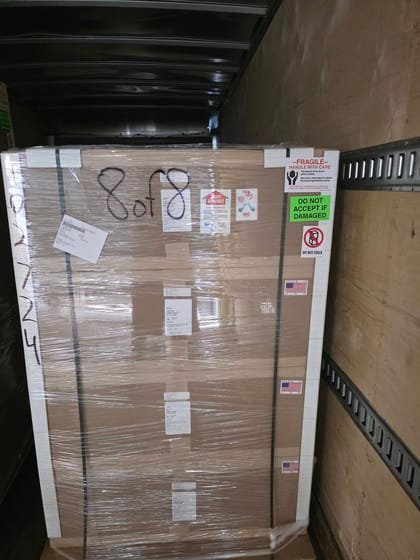 Palletised freight braced against the nose