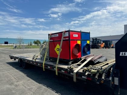 Machinery and timber secured on a flatbed