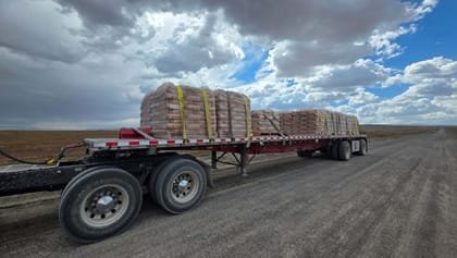 Palletised bags loaded across a flatbed