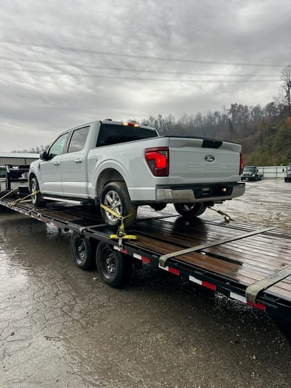 Pickup loaded on a hotshot trailer