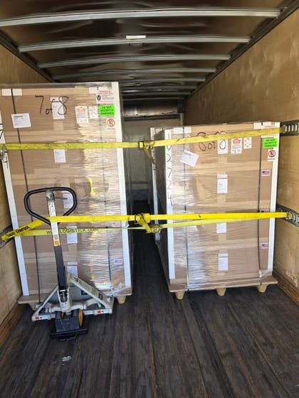 Wrapped pallets banded and strapped down