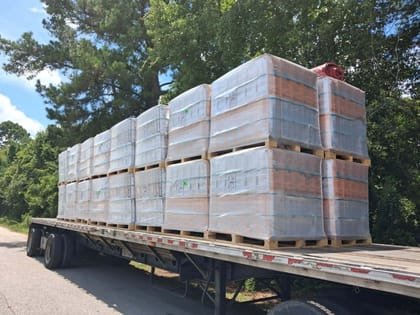 Bagged goods palletised on a flatbed